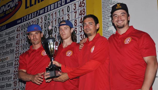Ferris State University holding their 2015 NCDGC trophy.